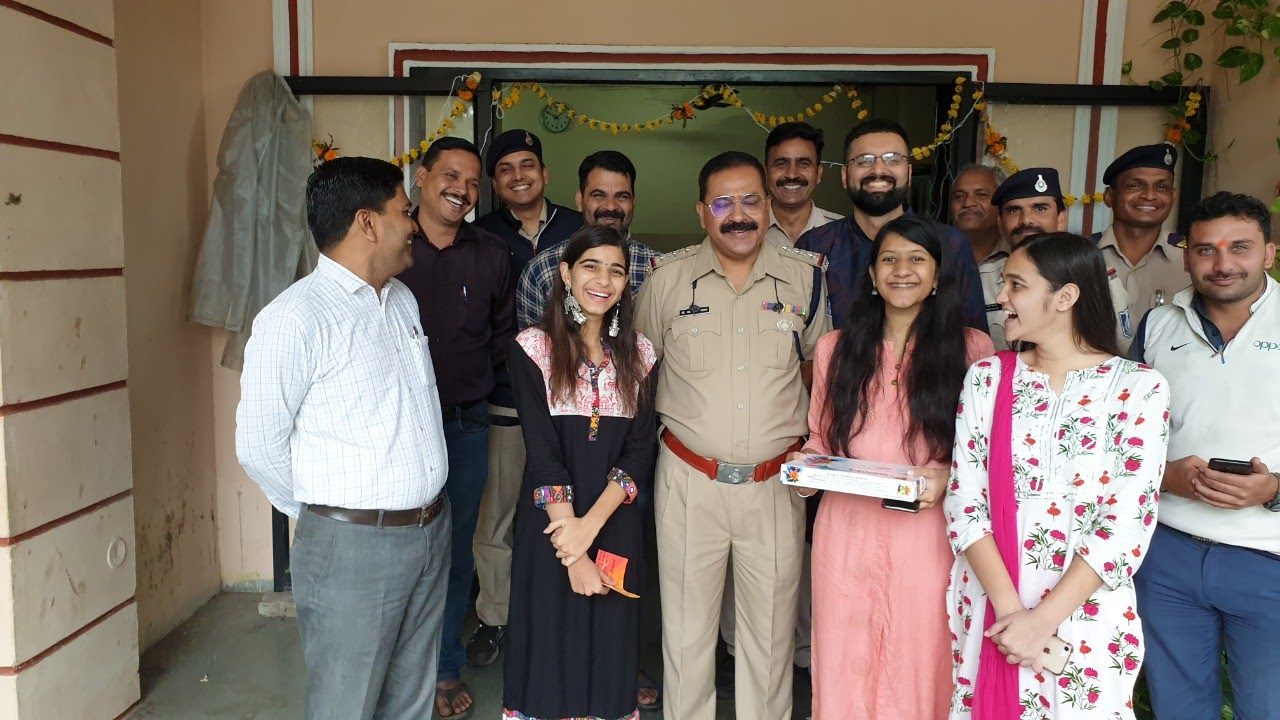 Volunteers posing outside a police thana in Indore